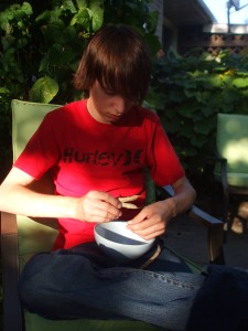 Jacob peeling "special" beans.